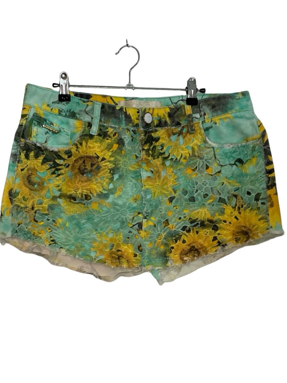 Lança Perfume shorts sunflower pattern against a teal wash Size us 6